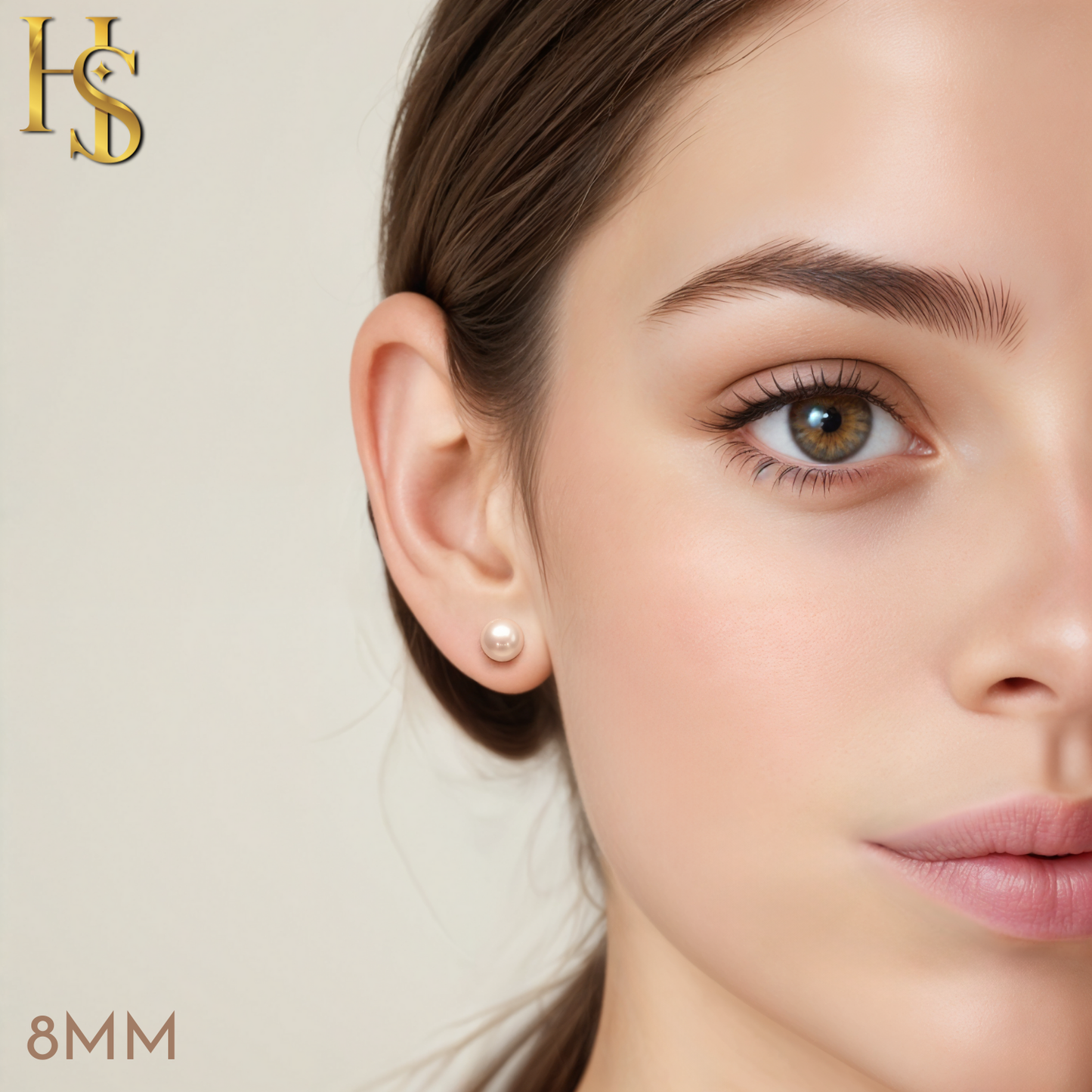 A round 8mm peach freshwater button pearl stud earring with a gold finish, worn on a model's ear.