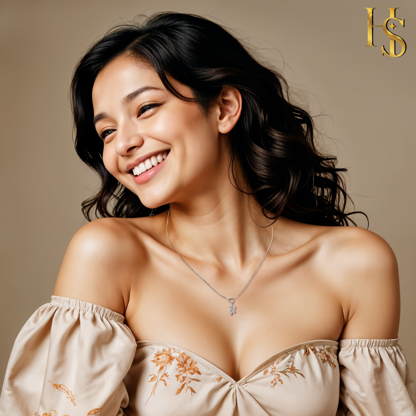 A sterling silver pendant necklace with a leaf-cluster motif set with American diamonds, worn on the neck of a smiling model.
