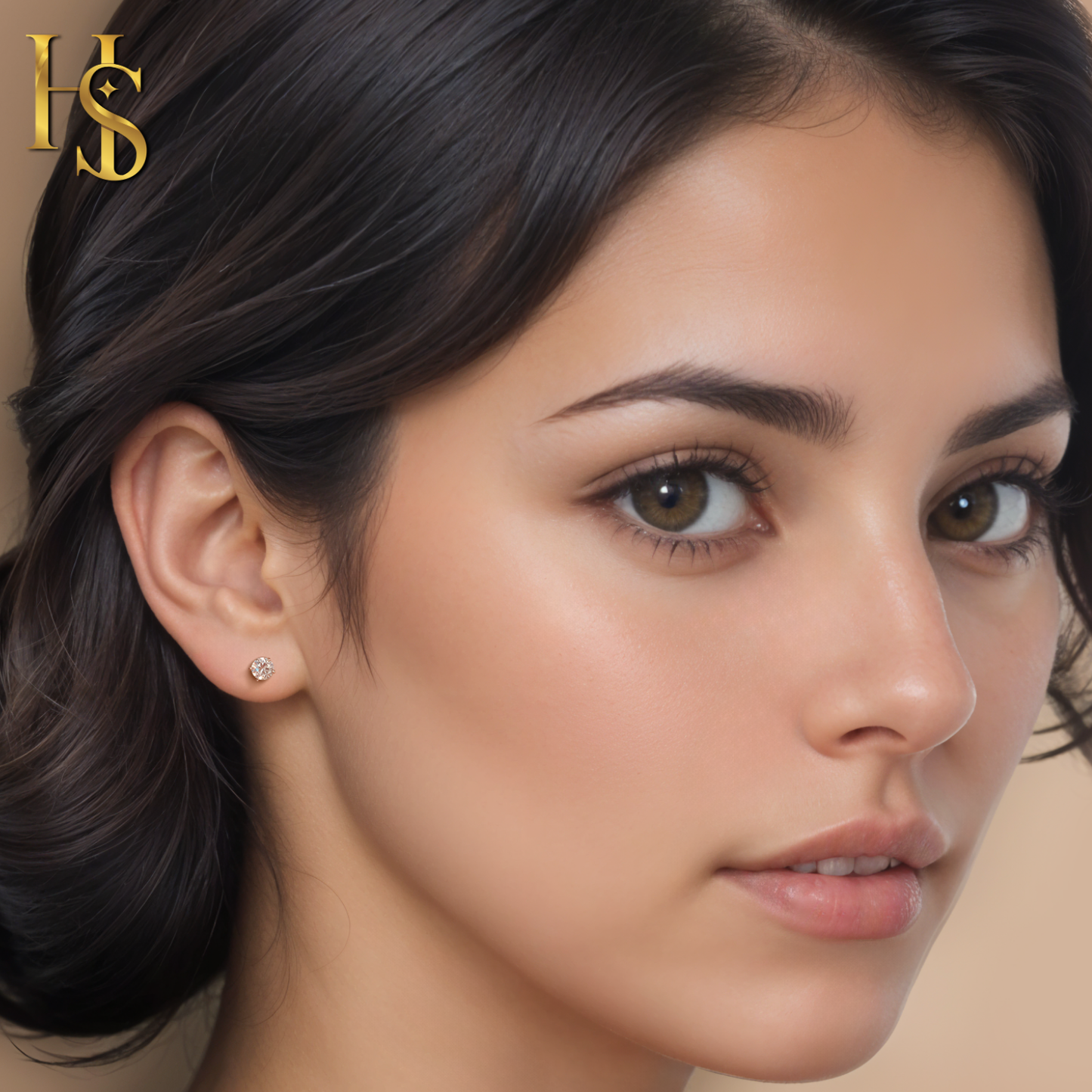A small, round solitaire stud earring with a four-prong set American diamond in sterling silver, worn on the ear of a model.