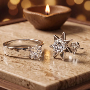 Men's 925 silver hammered band ring with a solitaire and a star stud earring, beside a lit diya - men's jewellery category
