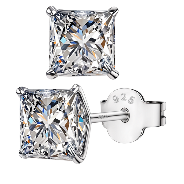 A pair of stud earrings with princess-cut American diamonds in a four-prong setting, made of sterling silver on a white background.