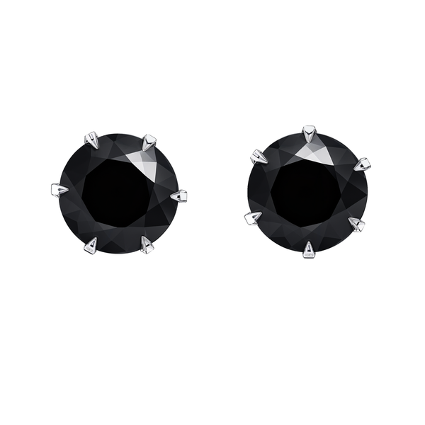 A pair of solitaire stud earrings with round-cut black American diamonds in a six-prong sterling silver setting on a white background.