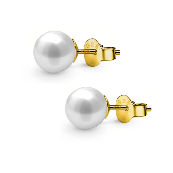 A pair of classic round white pearl stud earrings with gold-plated sterling silver push-back closures on a white background.
