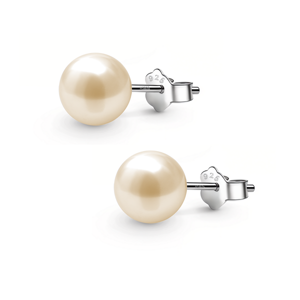 A pair of classic stud earrings with lustrous round peach pearls and sterling silver push-back closures, shown on a white background.