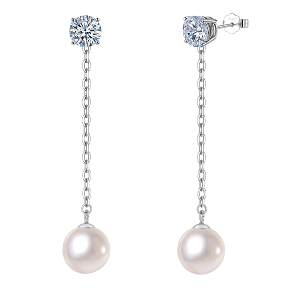 Sterling silver drop earrings with a four-prong American diamond stud, a chain, and a round pearl drop, shown on a white background.