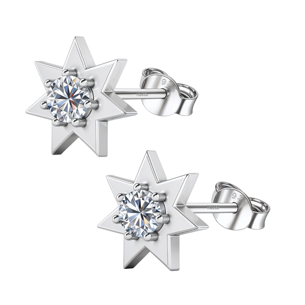 A pair of six-pointed star stud earrings in sterling silver with a central round American diamond in a six-prong setting on a white.