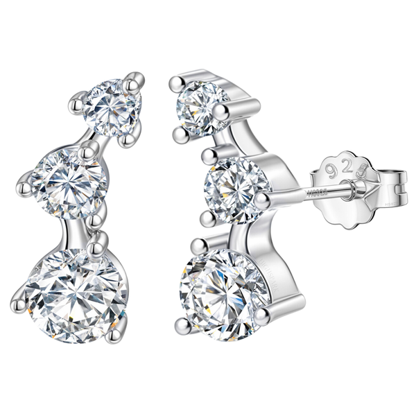 A pair of climber stud earrings with three graduated, round American diamonds in a four-prong setting, made of sterling silver.