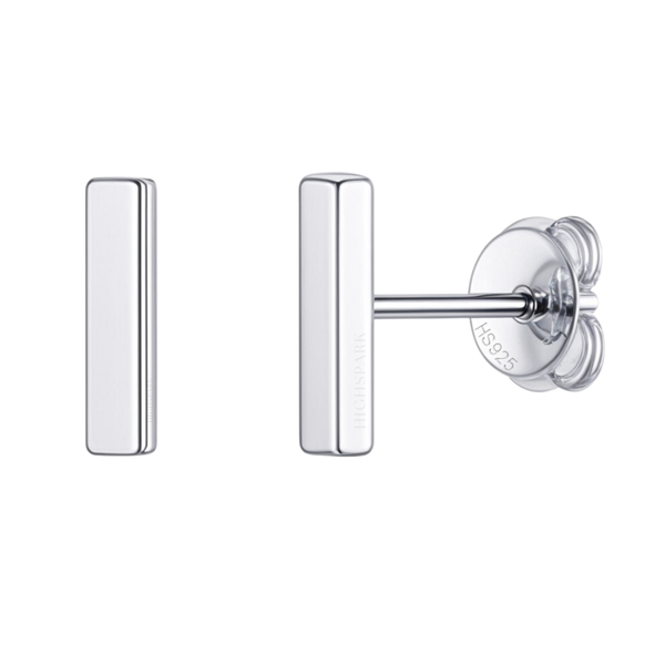 A pair of mini bar stud earrings in polished sterling silver, with one showing the post and push back, on a white background.