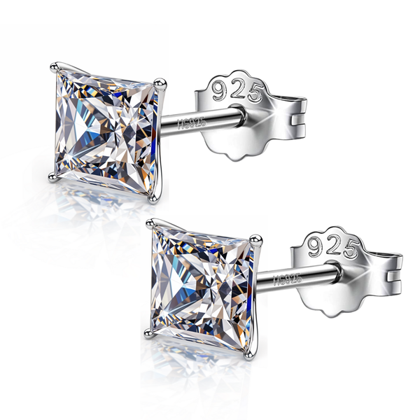 A pair of stud earrings with princess-cut American diamonds in a four-prong setting, made of sterling silver with push backs.