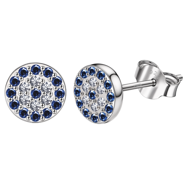 Round evil eye stud earrings with blue and clear American diamonds in a sterling silver setting, shown on a white background.