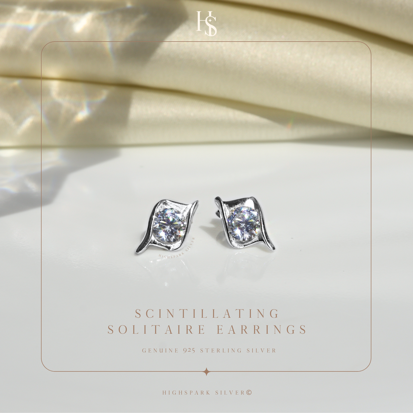 Designer Solitaire Earrings in 92.5 Silver embellished with Diamond Zirconia