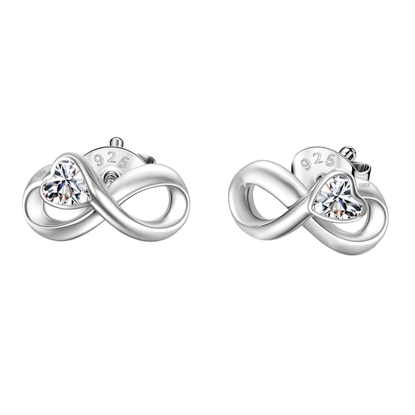 A pair of infinity-shaped stud earrings in sterling silver, each with a heart-cut American diamond in a bezel setting.