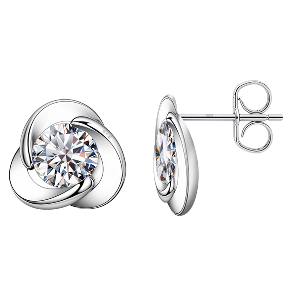 A pair of sterling silver stud earrings with a central round American diamond held in a three-petal swirl setting on a white background.