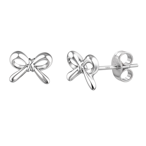 A pair of dainty bow-shaped stud earrings in polished sterling silver, shown with one butterfly back, on a white background.
