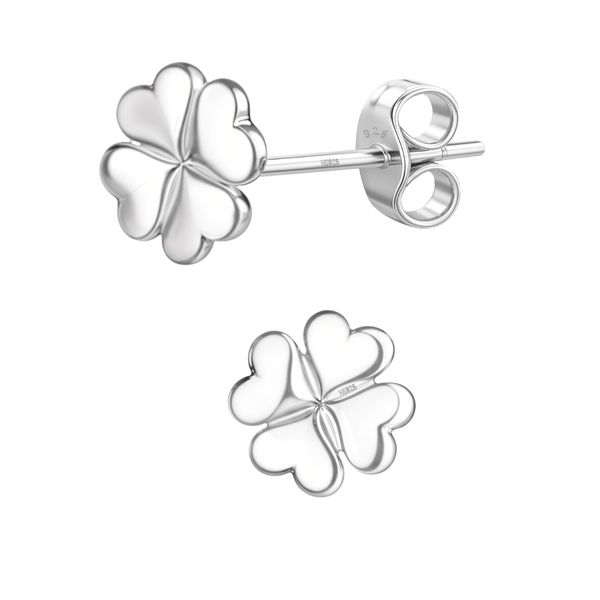 A pair of four-leaf clover stud earrings in polished sterling silver, shown with a butterfly push back on a plain white background.