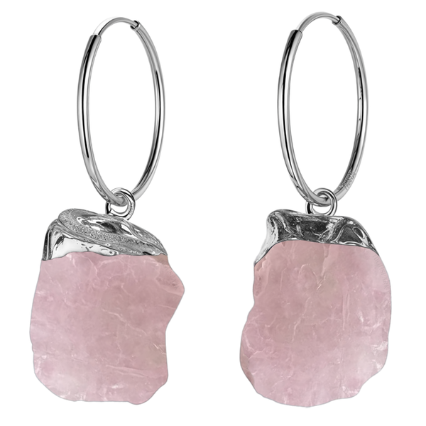 A pair of sterling silver hoop earrings with detachable raw-cut rose quartz gemstone charms on a plain white background.