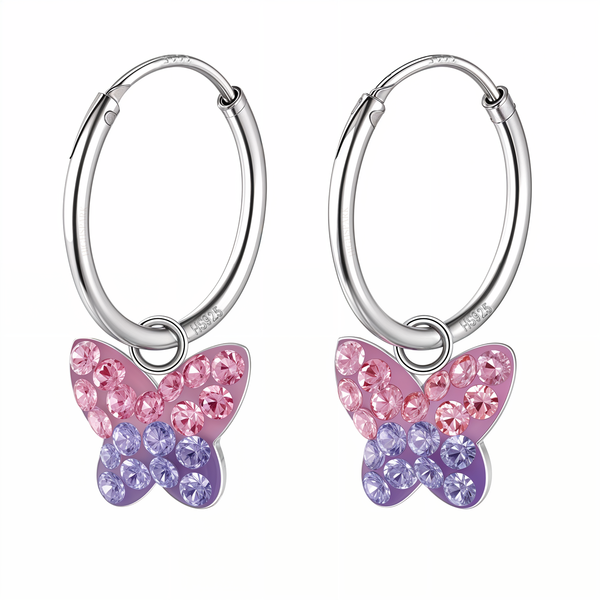 A pair of sterling silver dangle hoop earrings with butterfly charms featuring pink and purple American diamonds on a white background.