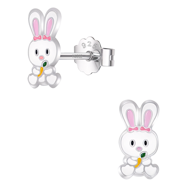 A pair of sterling silver stud earrings in a rabbit motif with white and pink enamel, shown on a plain white background.