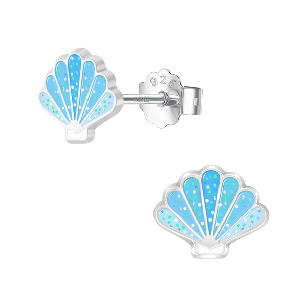 A pair of seashell stud earrings with blue glitter enamel, set in sterling silver with push-back closures on a white background.