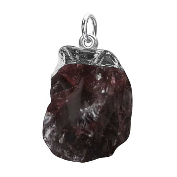 A sterling silver pendant featuring a rough-cut, natural garnet gemstone in a polished silver cap setting on a plain white background.