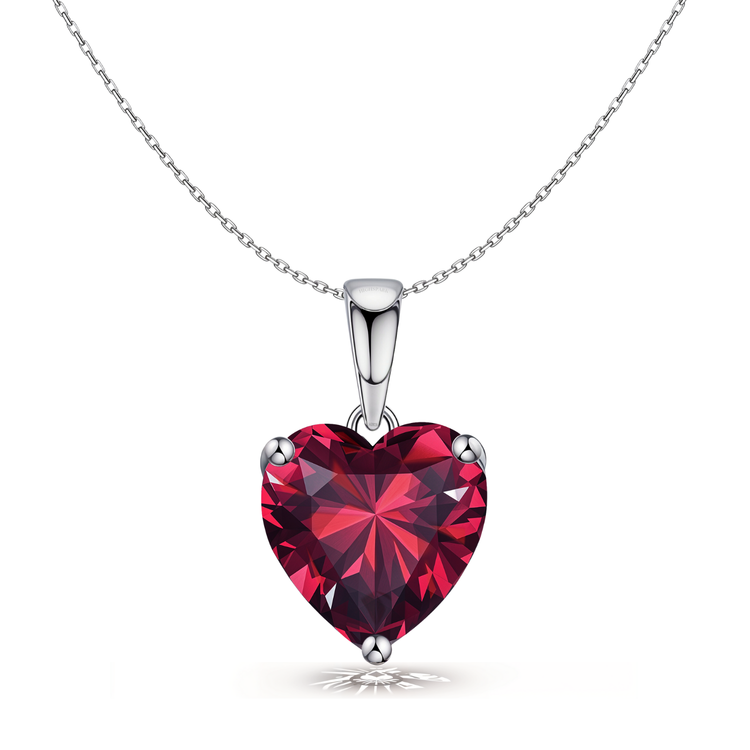 A solitaire pendant necklace with a large, heart-shaped red stone in a three-prong setting on a sterling silver chain.
