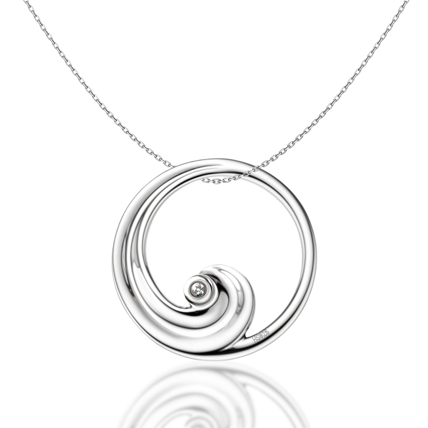 A sterling silver pendant necklace with a circular frame holding a wave motif with a single bezel-set American diamond on a white.
