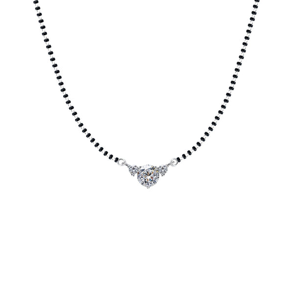 A chandi mangalsutra design with a trio of prong-set American diamonds on a traditional black bead chain made from sterling silver.