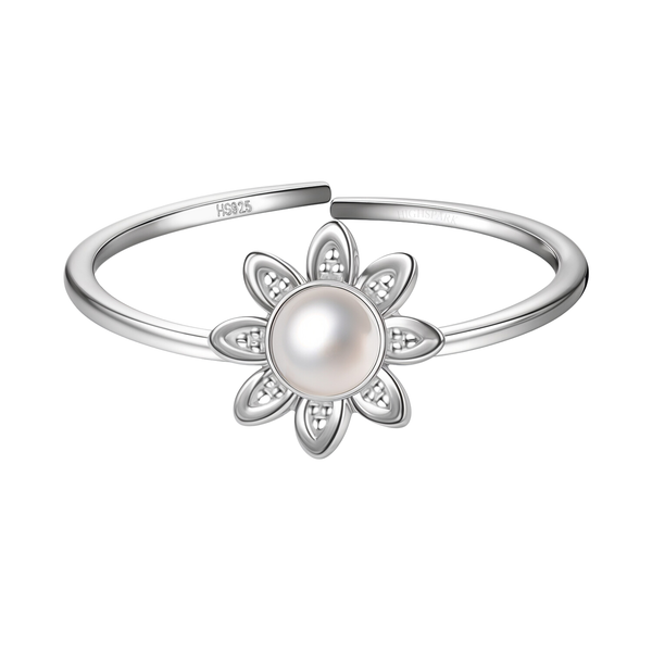 An adjustable sterling silver ring with a central pearl set in a flower motif with eight textured petals, shown on a white background.
