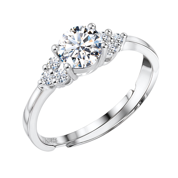 An adjustable sterling silver ring with a large round American diamond solitaire flanked by four smaller stones, on a white background.