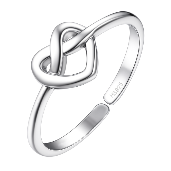 An adjustable sterling silver ring with a polished finish features a central heart-shaped infinity knot, shown on a white background.