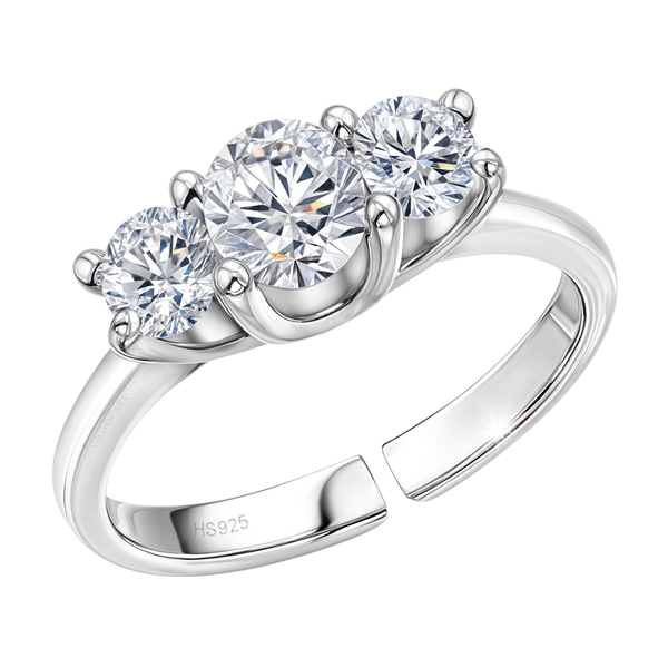 An adjustable sterling silver ring with three round American diamonds in a graduated four-prong setting on a plain white background.