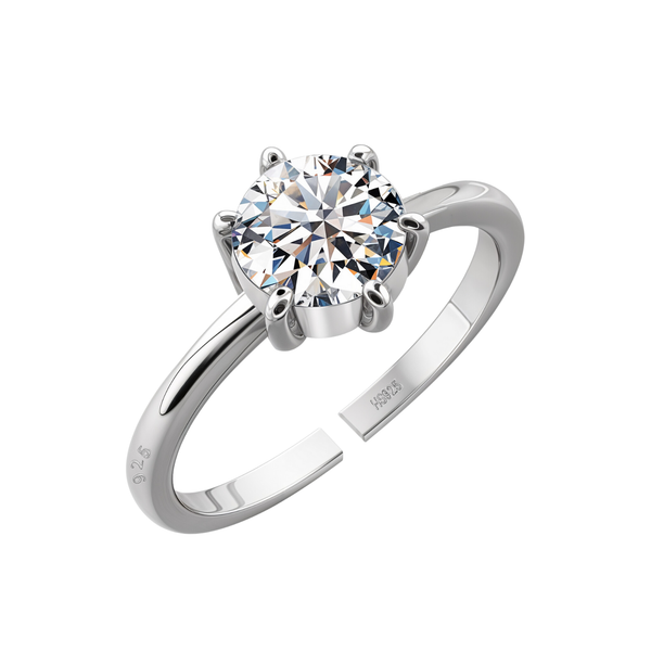 An adjustable solitaire ring with a round American diamond in a six-prong setting on a sterling silver band, shown on a white background.