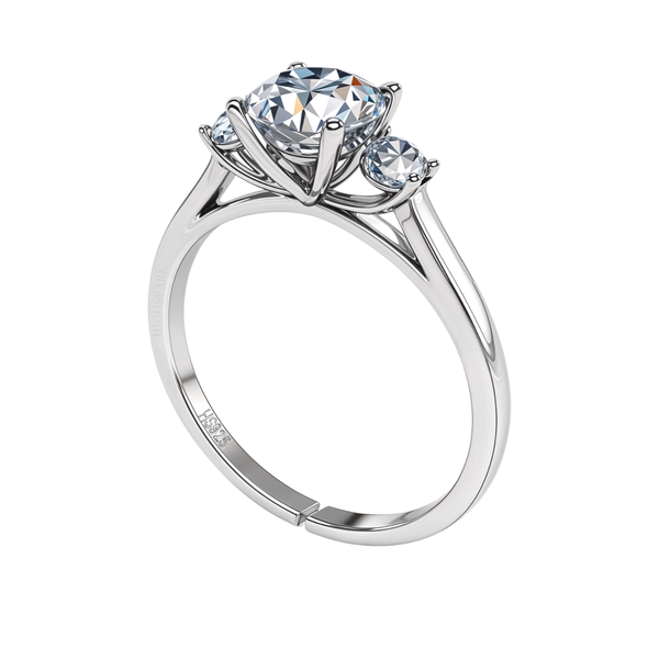 An adjustable sterling silver ring with a large round American diamond in a four-prong setting, flanked by two smaller round stones.