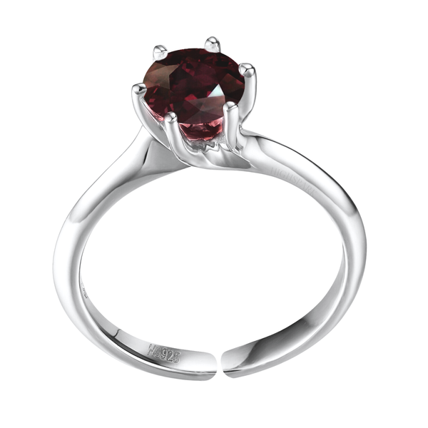An adjustable sterling silver solitaire ring featuring a round.