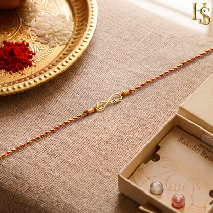 Red Twist Infinity Gold-Plated Silver Rakhi for Brother