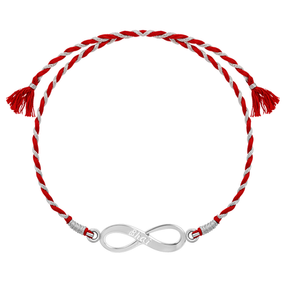 A 925 sterling silver rakhi for brother featuring an infinity knot centerpiece engraved with 'Bhai' on a red and silver braided thread.