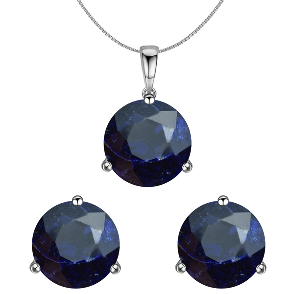 A sterling silver pendant and earrings set with round, faceted blue sodalite gemstones in a three-prong setting on a white background.