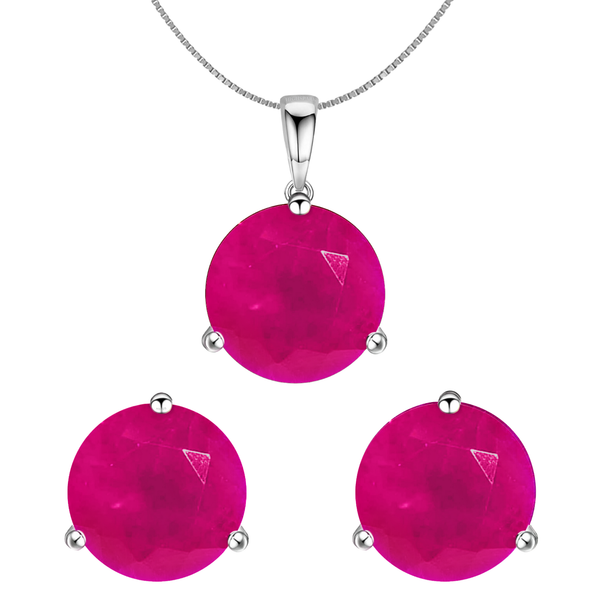 A sterling silver pendant and stud earring set featuring round, faceted pink jade gemstones held in a three-prong setting.