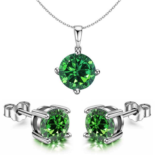A sterling silver pendant necklace and matching stud earrings set with round, brilliant-cut emerald green stones in a four-prong setting.