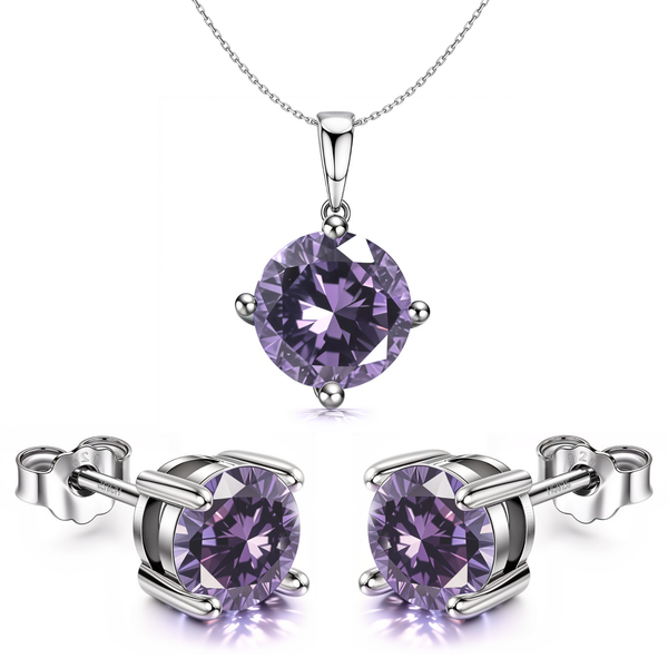 A sterling silver pendant and stud earring set with round purple alexandrite American diamonds in a four-prong setting on a white.