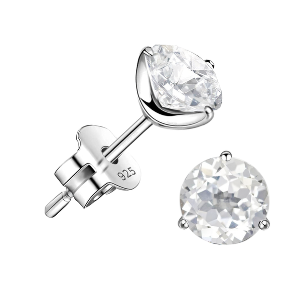 A pair of stud earrings with round-cut clear quartz gemstones in a three-prong sterling silver setting, shown on a white background.