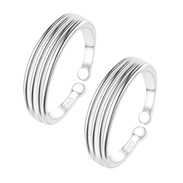 A pair of adjustable toe rings with a four-line band design, crafted in polished 925 sterling silver on a white background.