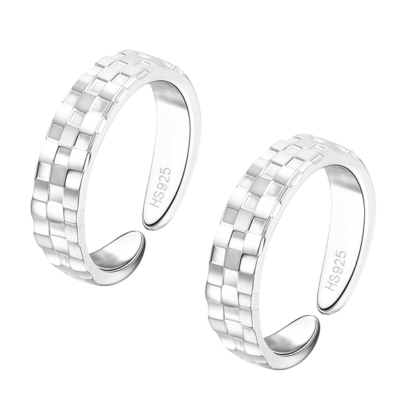 A pair of adjustable sterling silver toe rings with an embossed checkered pattern, shown on a plain white background.
