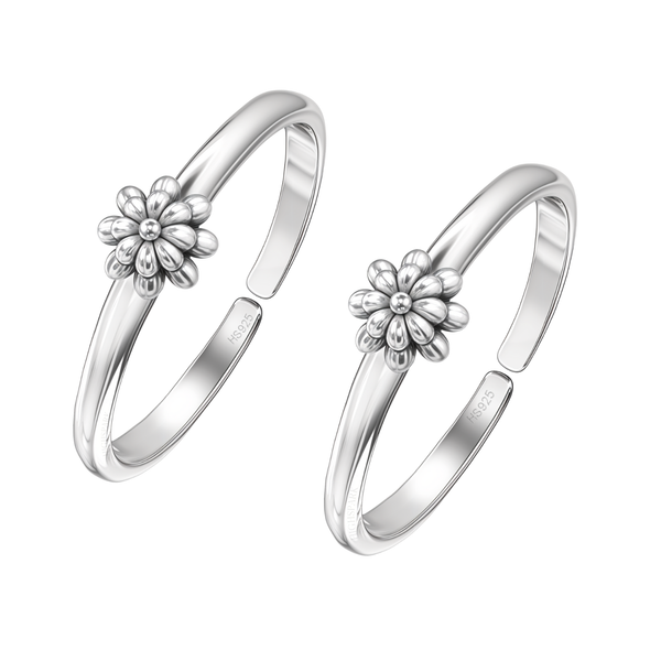 A pair of adjustable toe rings in sterling silver, each featuring a blooming daisy motif on a polished band, shown on a white background.