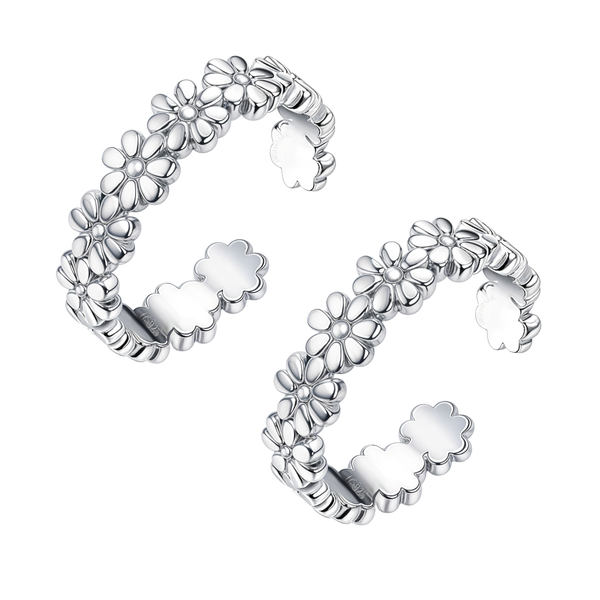 A pair of adjustable sterling silver toe rings designed as a continuous band of small, polished daisy flowers, shown on a white background.