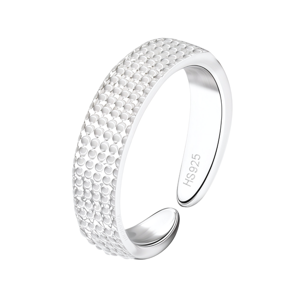 An adjustable toe ring in sterling silver with a wide band featuring an embossed dotted texture, shown on a white background.