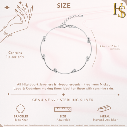Infographic showing the features of a sterling silver bracelet with bean knot charms, detailing its 7-inch length and 1.5-inch extension.