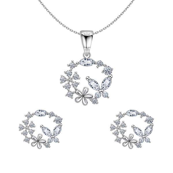 A sterling silver pendant necklace and matching stud earrings set with a circular wreath design featuring a butterfly and flower motif.