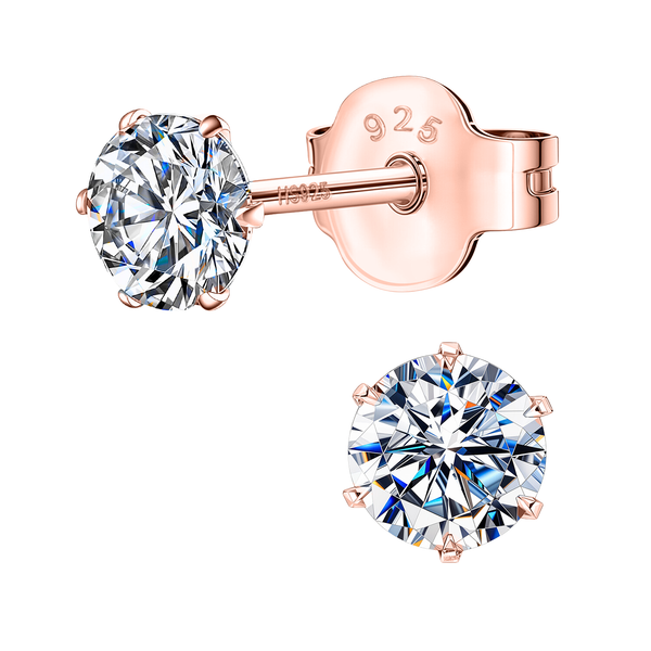 A pair of solitaire stud earrings with round American diamonds in a six-prong setting, made from rose gold-plated sterling silver.