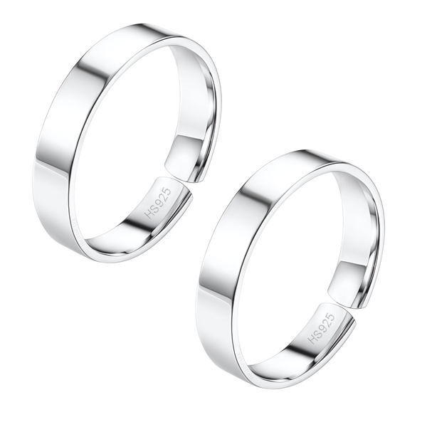 A pair of adjustable toe rings with a thick, flat band design in polished sterling silver, shown on a clean white background.